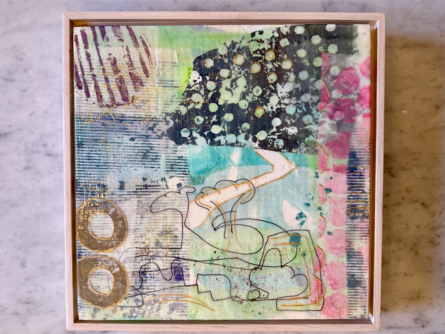 Framed layered work in soft turquoise, black, pink and gold